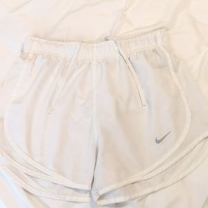 White Nike shorts